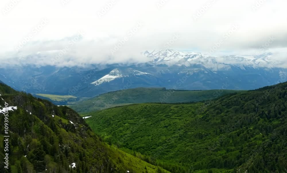 Breathtaking scenery of lush green mountains and serene valleys under cloudy skies, showcasing natures beauty with majestic snow capped peaks in distance. Breathtaking scenery of lush green mountains and serene valleys under cloudy skies, showcasing natures beauty with majestic snow capped peaks in distance.