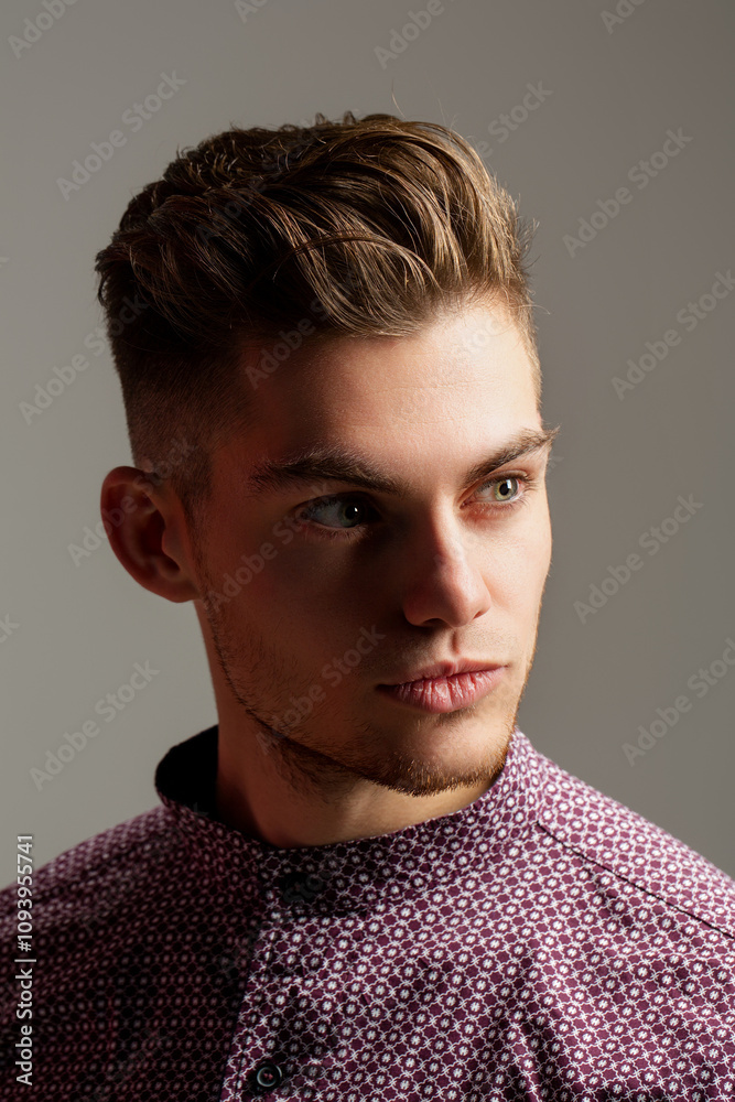Fototapeta premium Portrait of the handsome man in shirt. Young guy model headshot. Male face. Young handsome man. Confident male model. Man looking proud. Closeup face of attractive man. Elegant guy.
