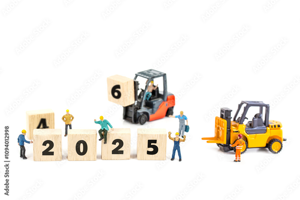 miniature worker team building standing front of forklift machine with 2025 number on wooden block on white background, decoration to Happy new year 2025 concept. miniature worker team building standing front of forklift machine with 2025 number on wooden block on white background, decoration to Happy new year 2025 concept.