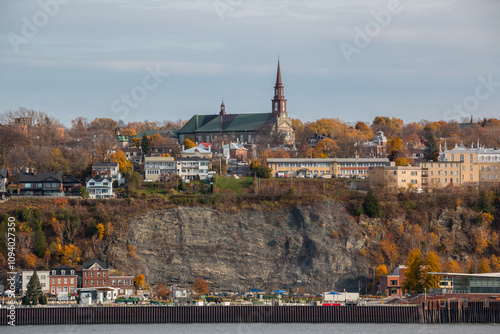 Riverside view of Levis, Quebec as seen from the St. Lawrence River. Our Lady of Victory Catholic Church, Saint-Joseph-de-Lévis Parish, Quebec, Canada during autumn.