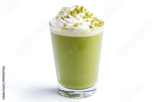 A creamy green beverage topped with whipped cream and green sprinkles.