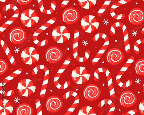 Seamless Christmas pattern with red and white striped candy canes and round sweet candies on a red background. New Year's pattern for wrapping paper, textile, print.