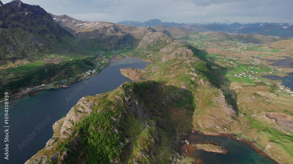 Touring from the air a wonderful fjord on the Lofoten Islands in spring. Touring from the air a wonderful fjord on the Lofoten Islands in spring.