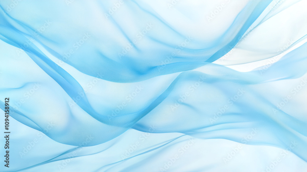 Fototapeta premium Soft blue fabric waves create calming patterns in natural light