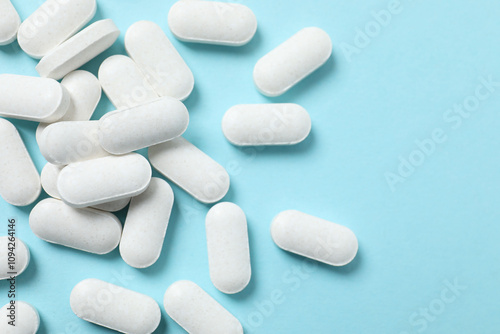 Medicine pills on a color background