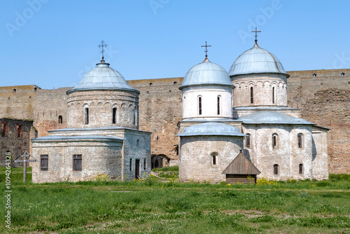 Two ancient churches in the Ivangorod fortress on a sunny July day. Leningrad region, Russia