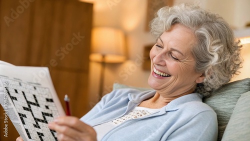 Senior Woman Smiling While Solving Crossword Sudoku at Home, Relaxing in Cozy Living Room
