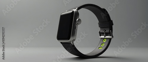 A silver and black smart watch with a black band sits on a grey background. The watch is sleek and modern, with a minimalist design that emphasizes its functionality