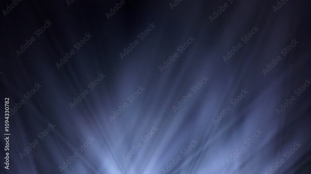 Spot Lights Background Loop. Several bright white stage lights pointing towards the center, of varying sizes. Black and White