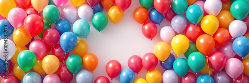 A large frame filled with multicolored balloons in different shapes and sizes, festive balloon displays, decorative frames, holiday setup inspiration