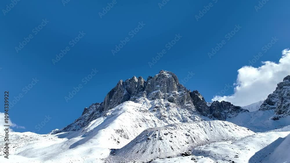 The landscape view of Fantastic scenery and snowy peaks scene at Caucasus Mountains in winter snow scene The landscape view of Fantastic scenery and snowy peaks scene at Caucasus Mountains in winter snow scene