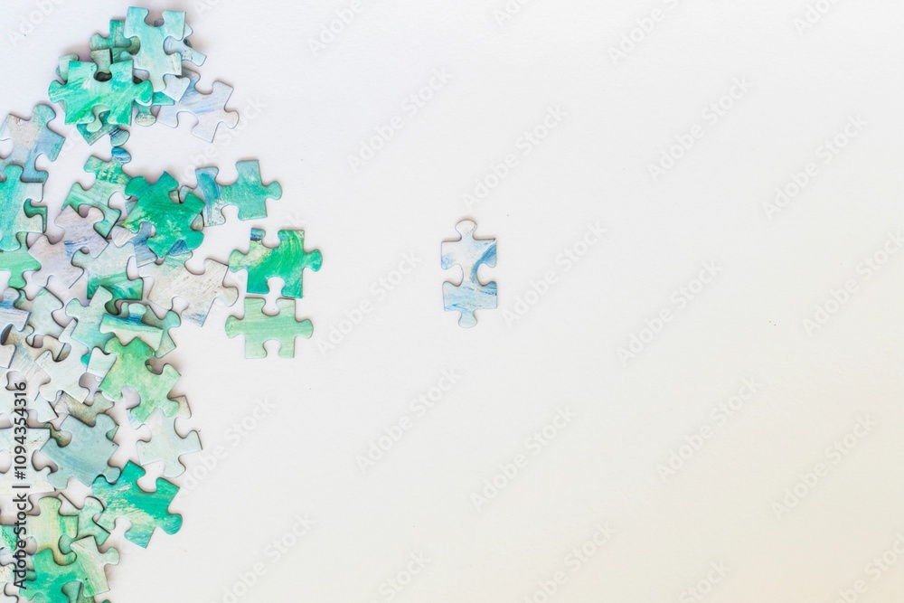 Colorful jigsaw puzzle pieces arranged on a white background Colorful jigsaw puzzle pieces arranged on a white background