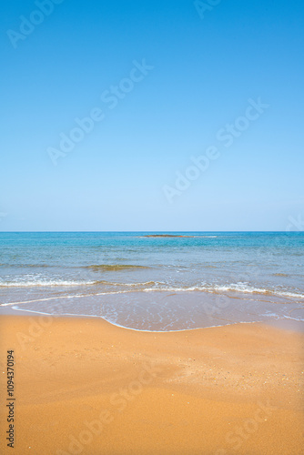  Cyprus Alagadi Turtle Beach. View from the beach to the sea. Magnificent beach, sea and blue cloudy sky. Yellow sand beach.