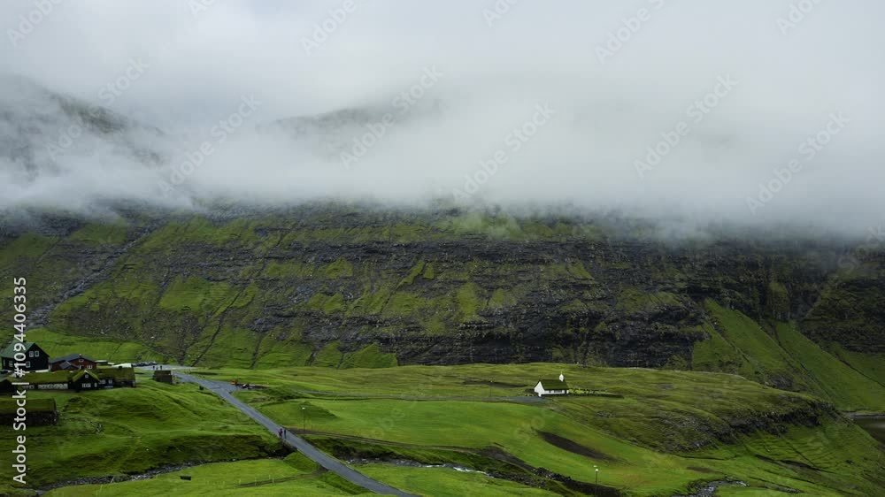 Time lapse of summer rural landscape scenery of Saksun village with typical turf - top houses, Faroe Islands. Denmark, Europe. Time lapse of summer rural landscape scenery of Saksun village with typical turf - top houses, Faroe Islands. Denmark, Europe.