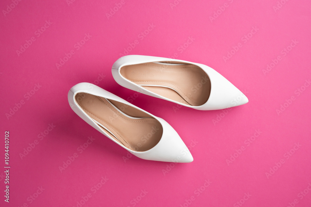 White pointed-toe kitten-heel pumps. Classic women's shoes. White pointed-toe kitten-heel pumps. Classic women's shoes.