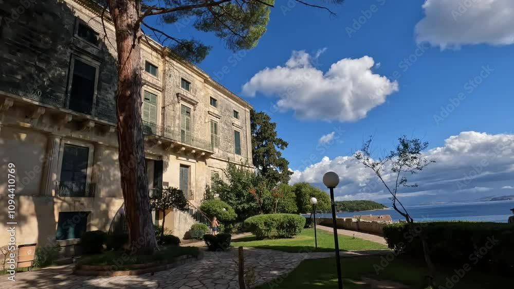 Exploring the historic architecture of Corfu, Greece on a sunny day by the waterfront Exploring the historic architecture of Corfu, Greece on a sunny day by the waterfront