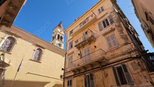 Wallpaper Mural Explore the charming streets of Corfu, Greece with historic buildings and sunny skies Torontodigital.ca