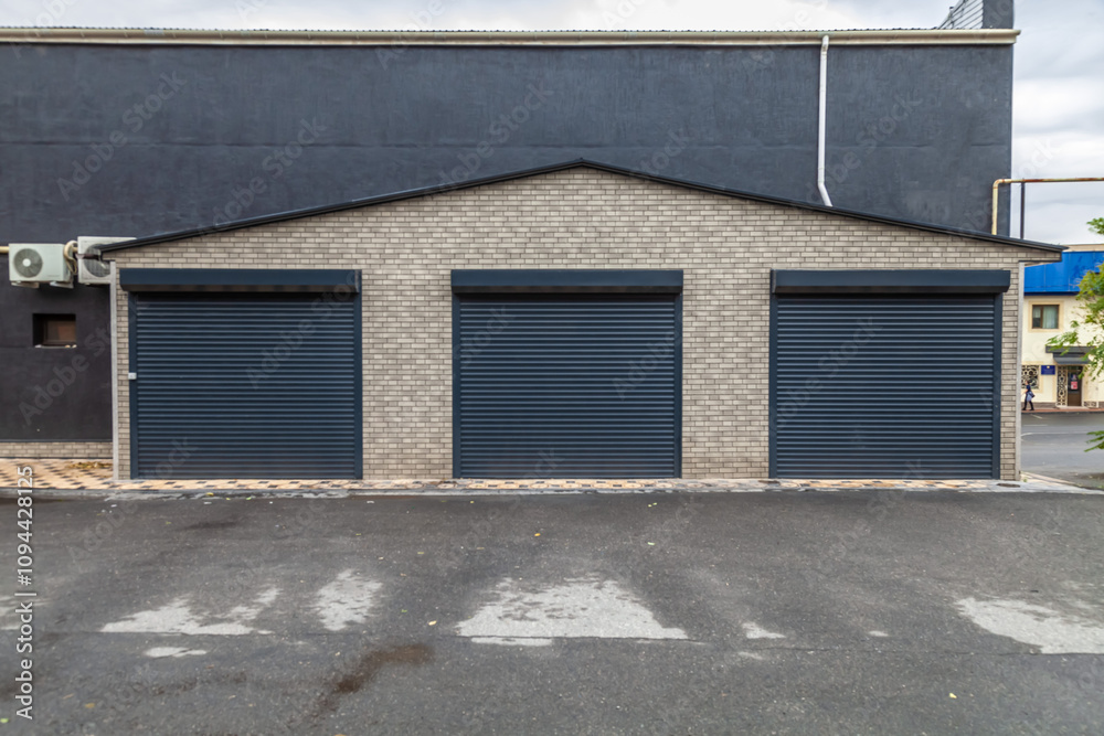 Garages for individual storage of things and mini-warehouses with automatic roller cargo doors