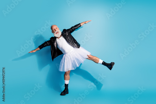 Photo of funky extravagant aged man hands aside playing wings plane flying wear dress isolated blue color background
