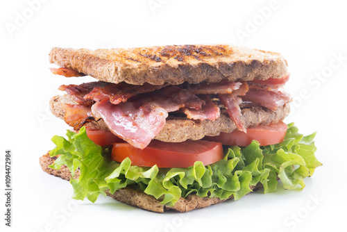 Bacon sandwich with lettuce and tomato isolated on white background photo