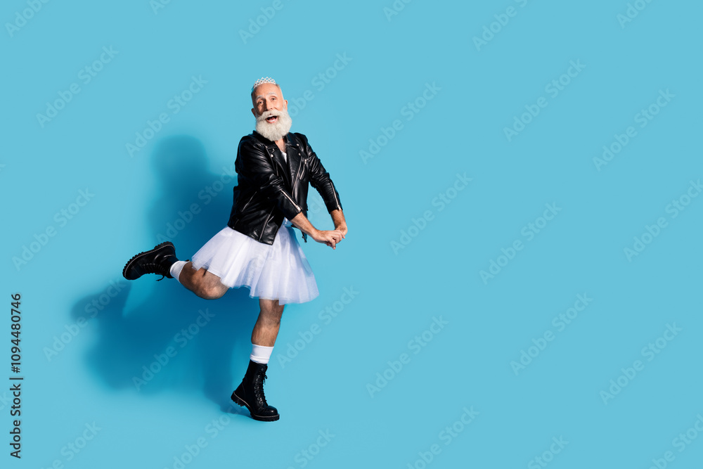 Photo of happy non binary man in female costume ballet dancing isolated blue color background Photo of happy non binary man in female costume ballet dancing isolated blue color background