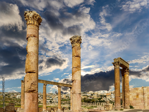 Roman ruins (against the background of a beautiful sky with clouds) in the Jordanian city of Jerash (Gerasa of Antiquity), capital and largest city of Jerash Governorate, Jordan #1094493367