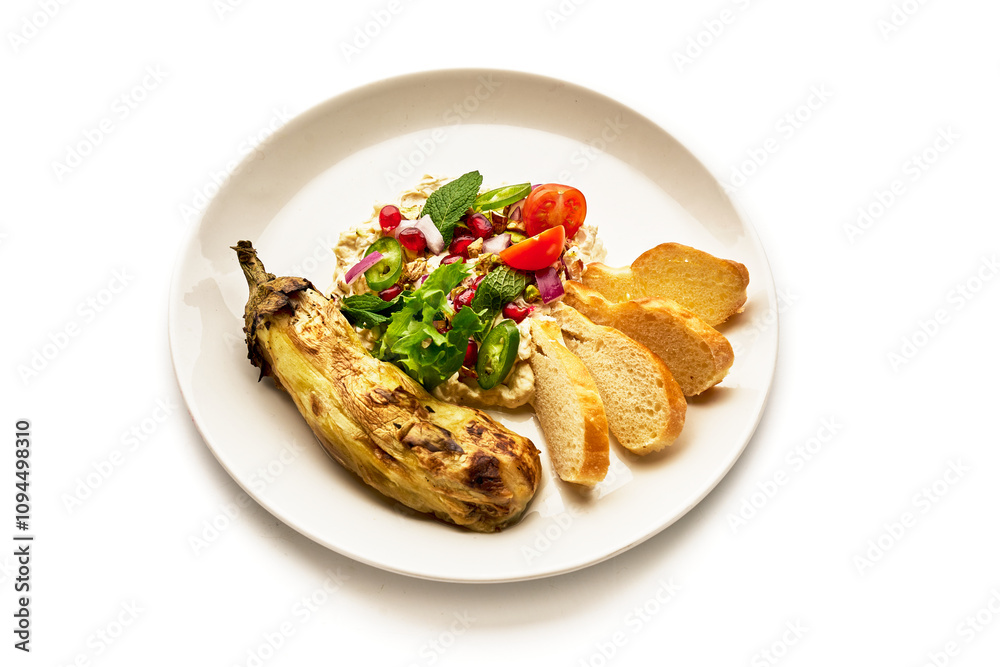 A plate of food with a vegetable and a salad