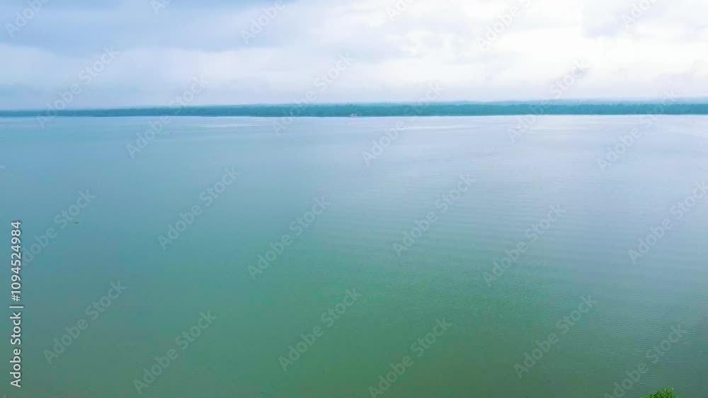 Beautiful view of a river lying quietly in the early morning. Areal view of vembanadu lake Kerala India. Beautiful view of a river lying quietly in the early morning. Areal view of vembanadu lake Kerala India.