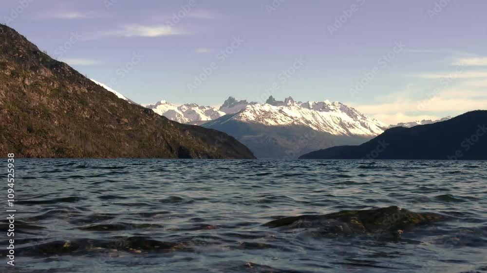 Crystal Clear Lake and Rugged Mountains, Lake in Patagonia, Argentina Crystal Clear Lake and Rugged Mountains, Lake in Patagonia, Argentina