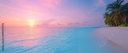 Beautiful sunset over tranquil ocean with pastel colors and serene beach land...