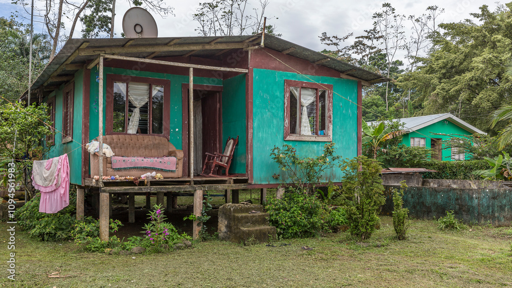 Traditional wooden house on stilts in the Puerto Lemon region, Costa Rica Traditional wooden house on stilts in the Puerto Lemon region, Costa Rica