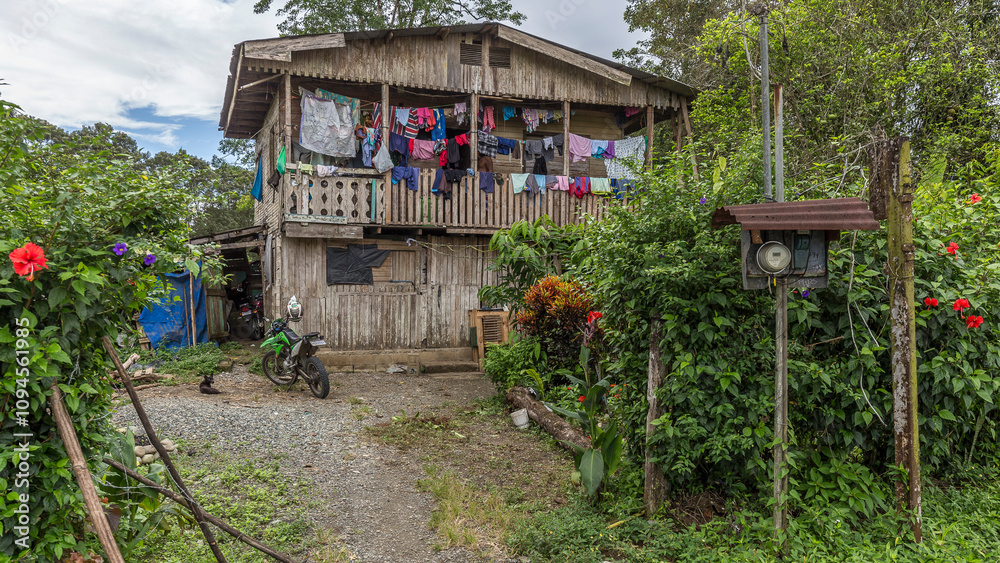 Traditional wooden house on stilts in the Puerto Lemon region, Costa Rica Traditional wooden house on stilts in the Puerto Lemon region, Costa Rica