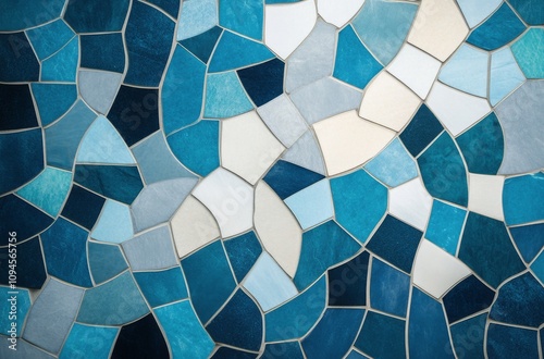 Abstract mosaic design featuring blue and white patterns resembling waves and...