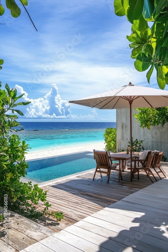 Beautiful tropical patio with ocean view and pool during sunny daytime