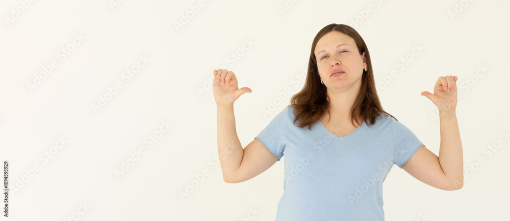 Close up photo amazing beautiful lady thumbs indicate direct chest self-confident I am best choice choose pick select me advice wear casual blue t-shirt isolated white background Close up photo amazing beautiful lady thumbs indicate direct chest self-confident I am best choice choose pick select me advice wear casual blue t-shirt isolated white background