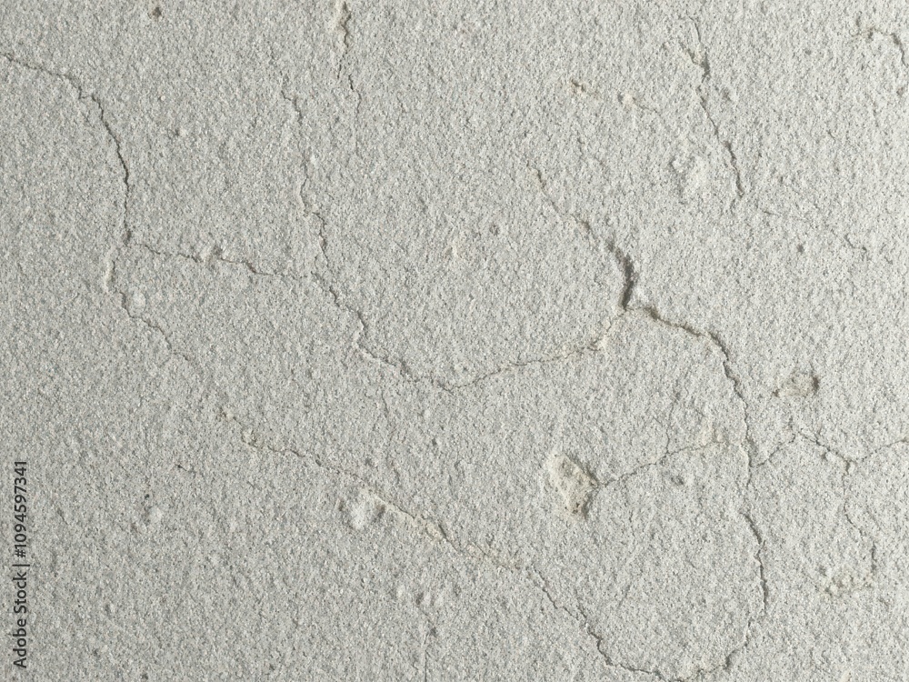 Obraz premium Rough grey stone surface with natural texture, solid