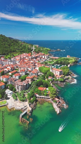 Aerial view of Mundaka, a picturesque fishing village on the Cantabrian Sea in Biscay, Basque Country, northern Spain. A beautiful coastal destination renowned for its charm and natural beauty photo