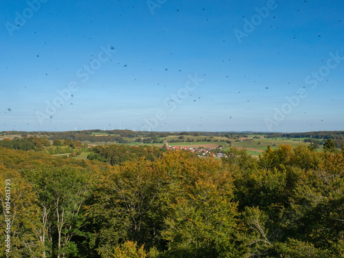 Schwaebische Alb, Germany - October 1st 2023: View from the famous Roemerstein viewpoint over hills and forests photo
