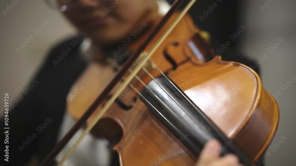 Cinematic Close-up Musician playing Violin at classical concert