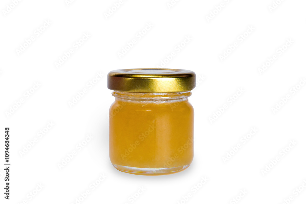 Tasty natural honey in glass jar isolated on white background. Bee icon. High quality photo Tasty natural honey in glass jar isolated on white background. Bee icon. High quality photo