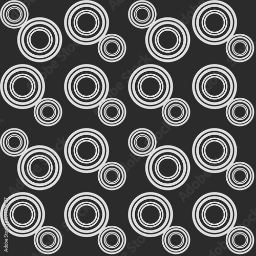 Circles seamless pattern creating a stylish background design in black and white tones