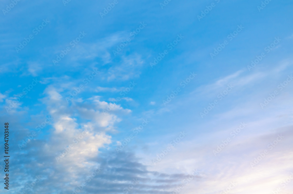 Picturesque evening sunset sky background, scenic cumulus clouds in the picturesque sunset sky, evening sky view Picturesque evening sunset sky background, scenic cumulus clouds in the picturesque sunset sky, evening sky view