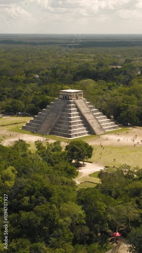 Aerial view of Pyramid of Kukulcan in the Mexican city of Chichen Itza. Vertical video