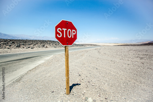 Stop sign somewhere in Death Valley National Park , Nevada , USA