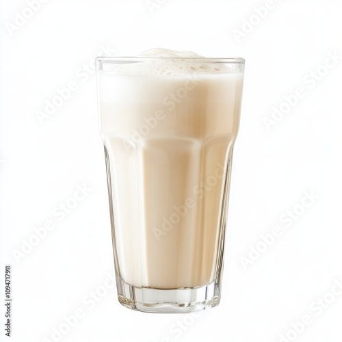 A tall clear glass filled with fresh white milk showing condensation on the outside isolated on a white background