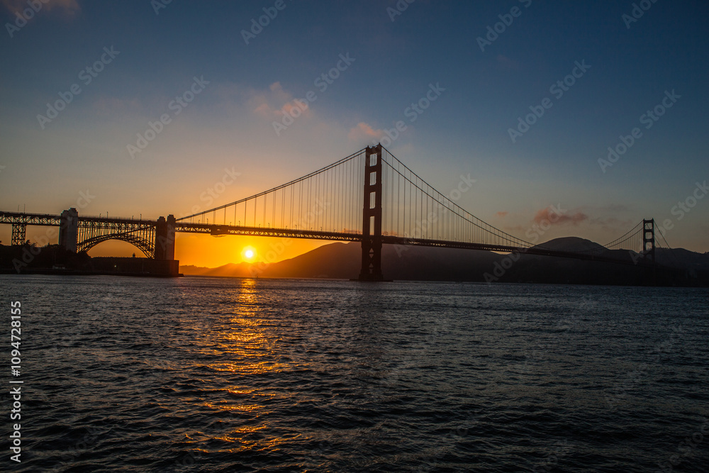 Golden Gate bridge sunset on a sunny day in july , San Francisco , USA Golden Gate bridge sunset on a sunny day in july , San Francisco , USA