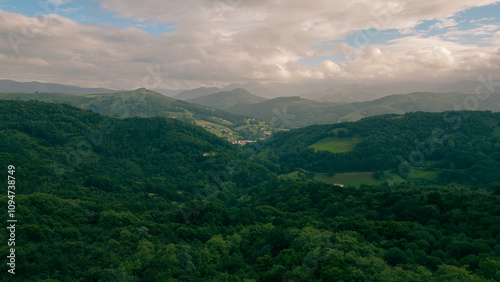 Wallpaper Mural A breathtaking view of lush green hills unfolds, capturing the serenity of the French Pyrenees on the Camino de Santiago. Torontodigital.ca