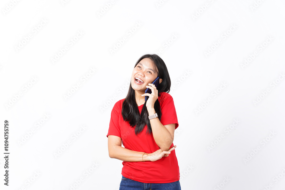 beautiful Asian woman poses while talking on a smartphone, exuding charm against a clean white background beautiful Asian woman poses while talking on a smartphone, exuding charm against a clean white background