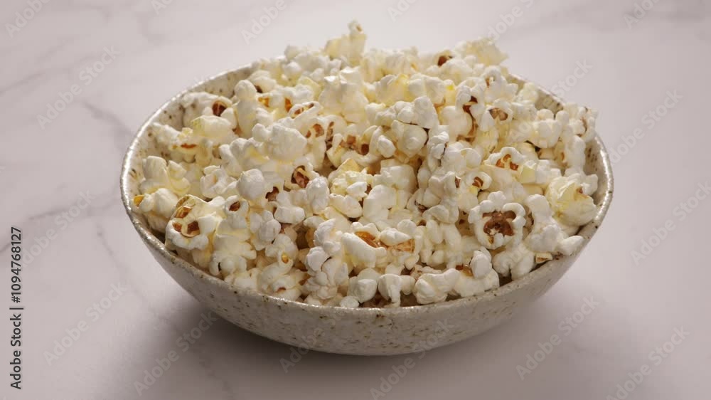 pop corn in bowl on light surface food pop corn in bowl on light surface food