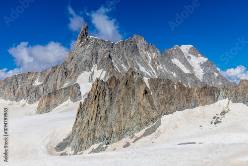 Dente di Gigante mountain summit in Italian Alps. Massiv du Mont Blanc, Monte BIanco di Courmayeur. Dent du Geant peak view from Skyway Montebainco viewpoint and cable car photo